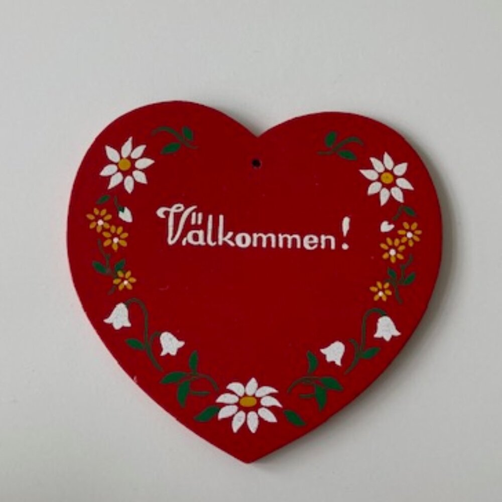 Swedish hand painted welcome sign